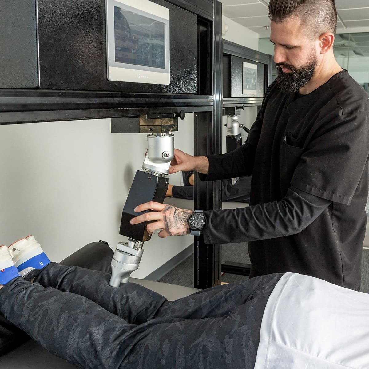 RX2600 robotic therapy applied to a patient’s leg at Thera Performance Lab in Lake Orion, MI