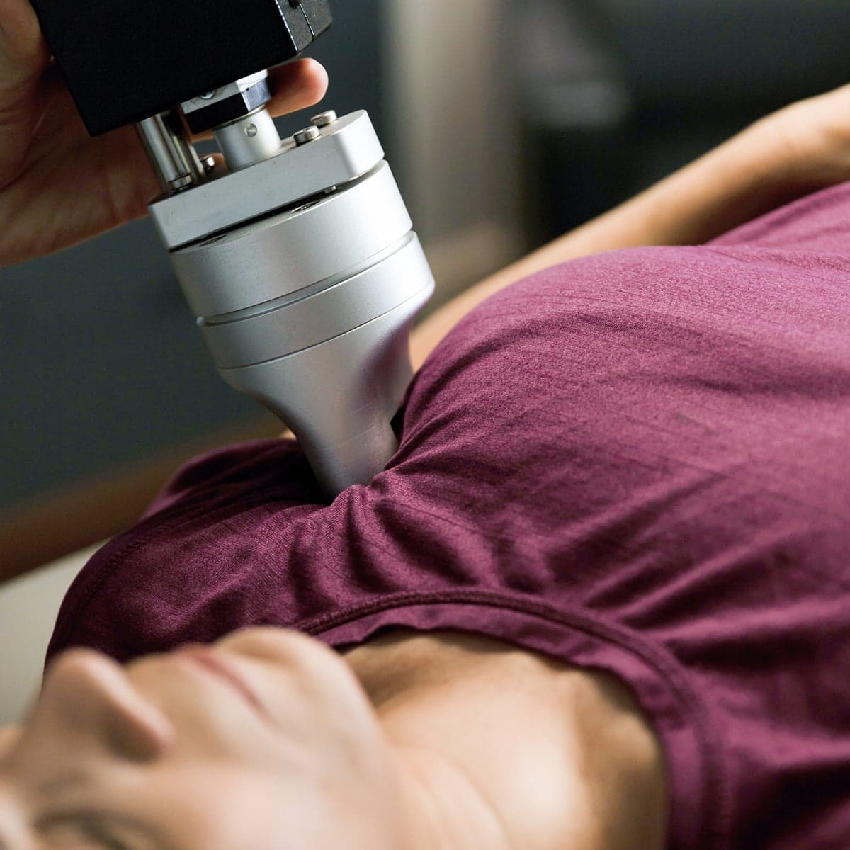 Robotic precision therapy applied to a patient’s shoulder at Thera Performance Lab in Lake Orion, MI