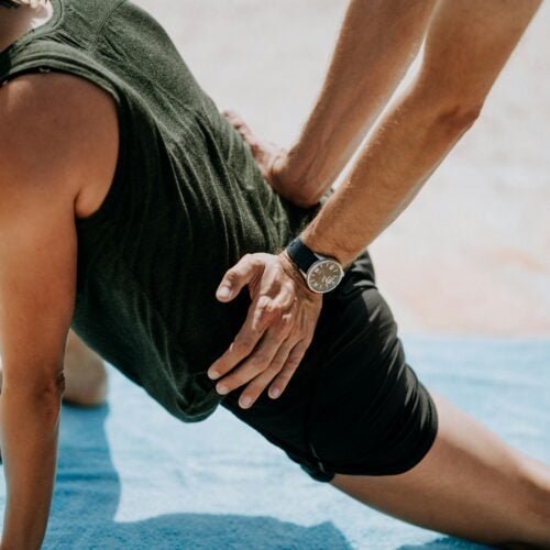 Person working a physical therapist as part of mobility recovery after hip replacement in Lake Orion, MI